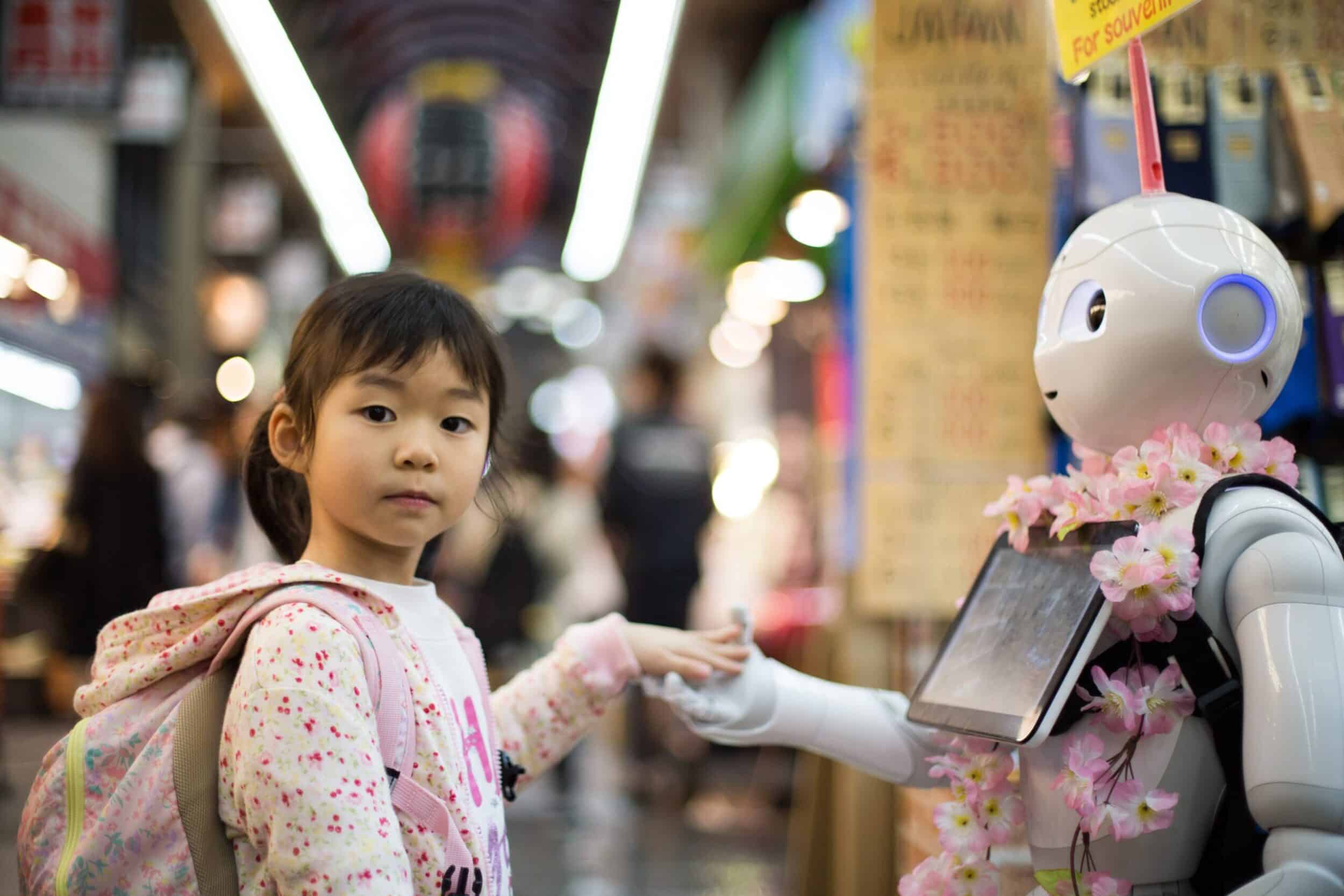 A robot, one of the types of artificial intelligence is helping a kid